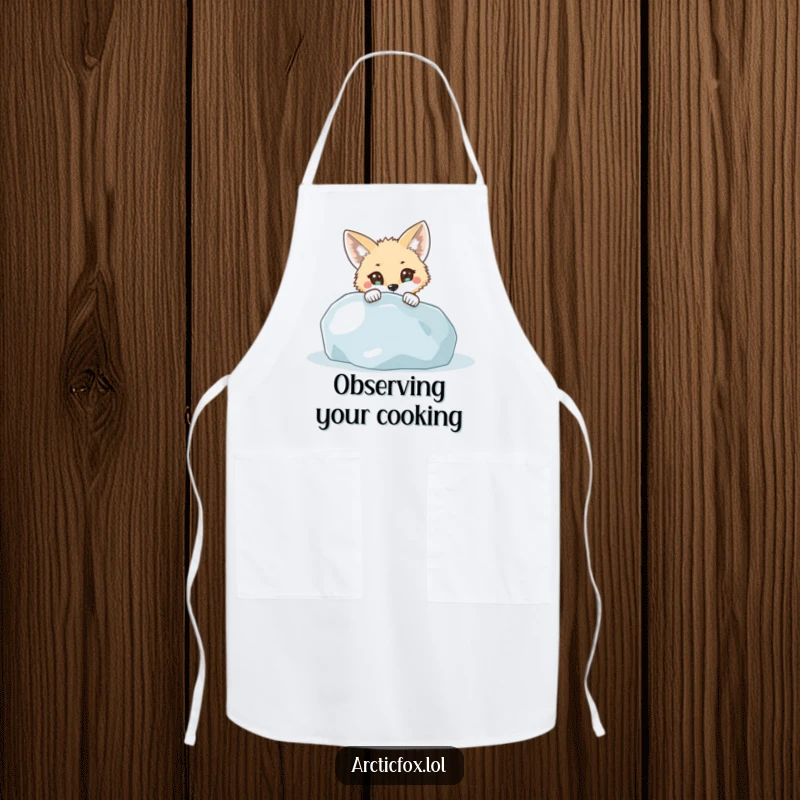 Funny Apron: A curious arctic fox with wide eyes peeking from behind an icy boulder, perfect for a playful kitchen experience.