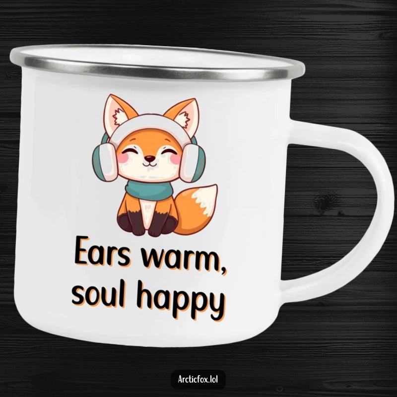 Funny Camping Mug: A content fox wearing earmuffs, enjoying the outdoors, perfect for sipping hot drinks humorously.