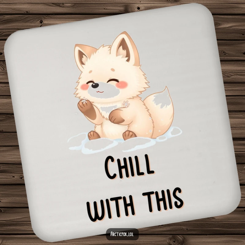 Funny arctic fox coaster showing a fluffy fox with paws in snow, gleefully catching a snowflake.