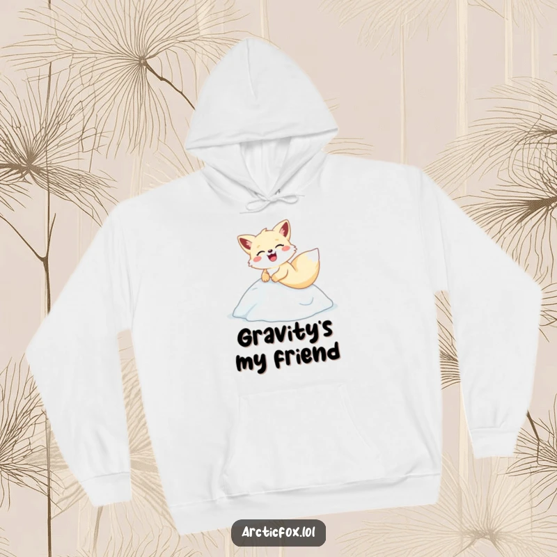 Funny arctic fox hoodie, comically sliding and laughing down an icy slope, perfect for cozy winter amusement.