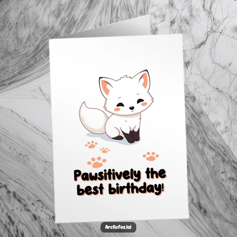 Funny Free Printable Birthday Card: Cute Arctic fox leaving playful paw prints in fresh snow, spreading joy.