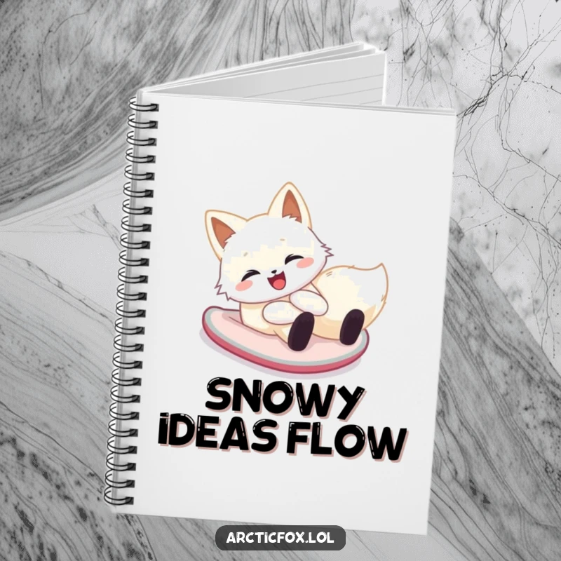 Funny arctic fox notebook featuring a happy creature sliding down a snowy hill on its belly, perfect for journaling winter fun.