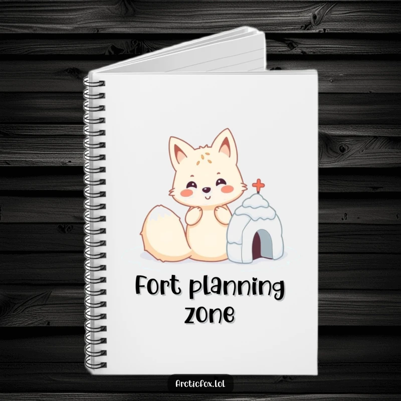 Funny Kawaii arctic fox building a small snow fort, a cute and amusing notebook.