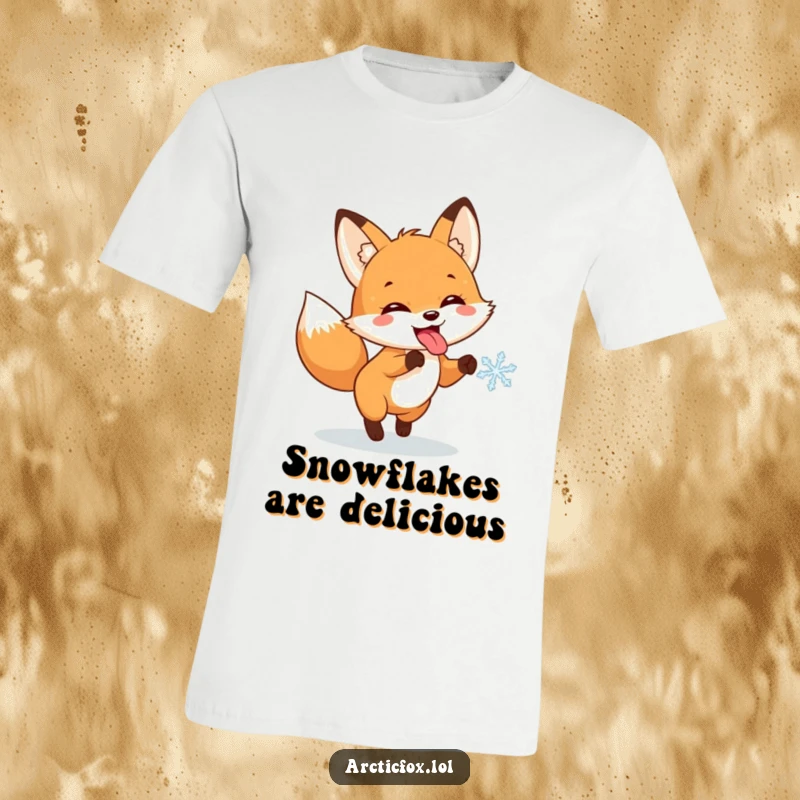 Funny t-shirt showing a playful fox with its tongue out, eagerly chasing a single snowflake with pure, uninhibited joy.