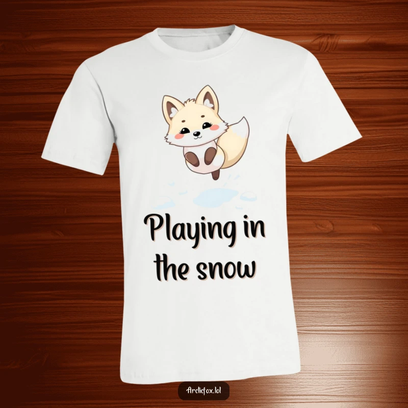 Funny Kawaii Arctic Fox T-Shirt: An adorable arctic fox in a kawaii style, captured mid-air as it leaps playfully in fresh snow.