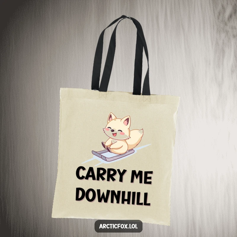 Cute Arctic fox sliding gleefully down a snowy slope, on a stylish tote bag, perfect for winter fun.
