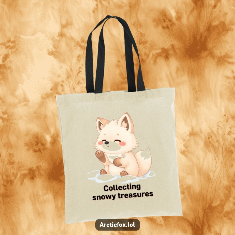 Funny arctic fox tote bag depicting a fluffy fox with paws in snow, gleefully catching a snowflake.